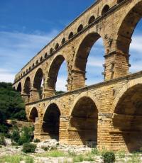 Aqueduct in France.  Many faces of Europe.  France.  Pont du Gard.  Aqueduct of Pont du Gard: architectural features and its purpose